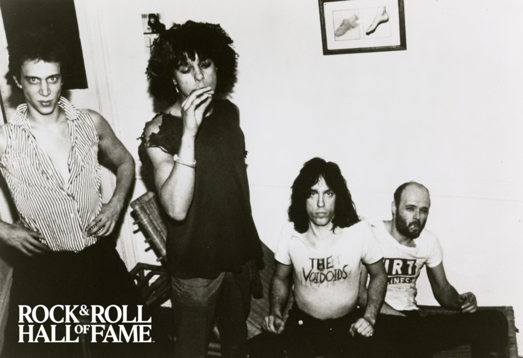 A picture of four men in the band the Voidoids. The man second from the left is smoking a cigarette.